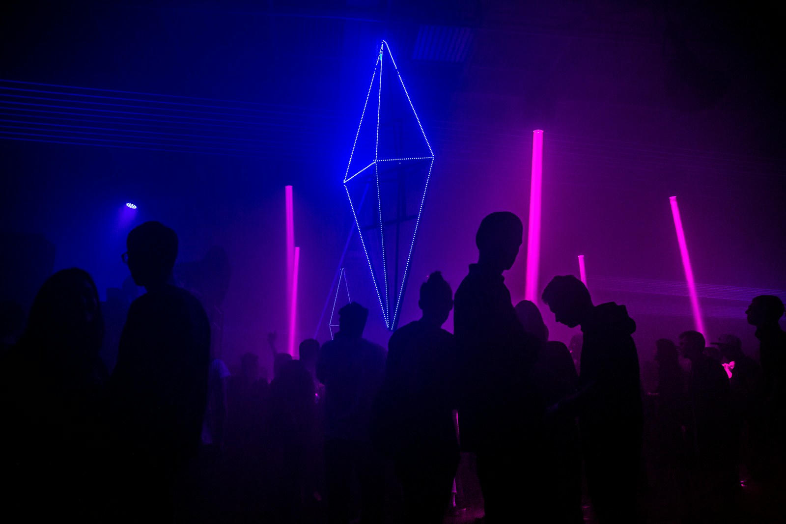 silhouette photography of people gathered inside bar